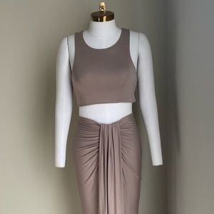 New in pack two piece skirt set. Size small medium and large available.